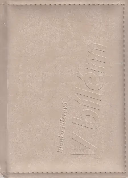 V bílém
